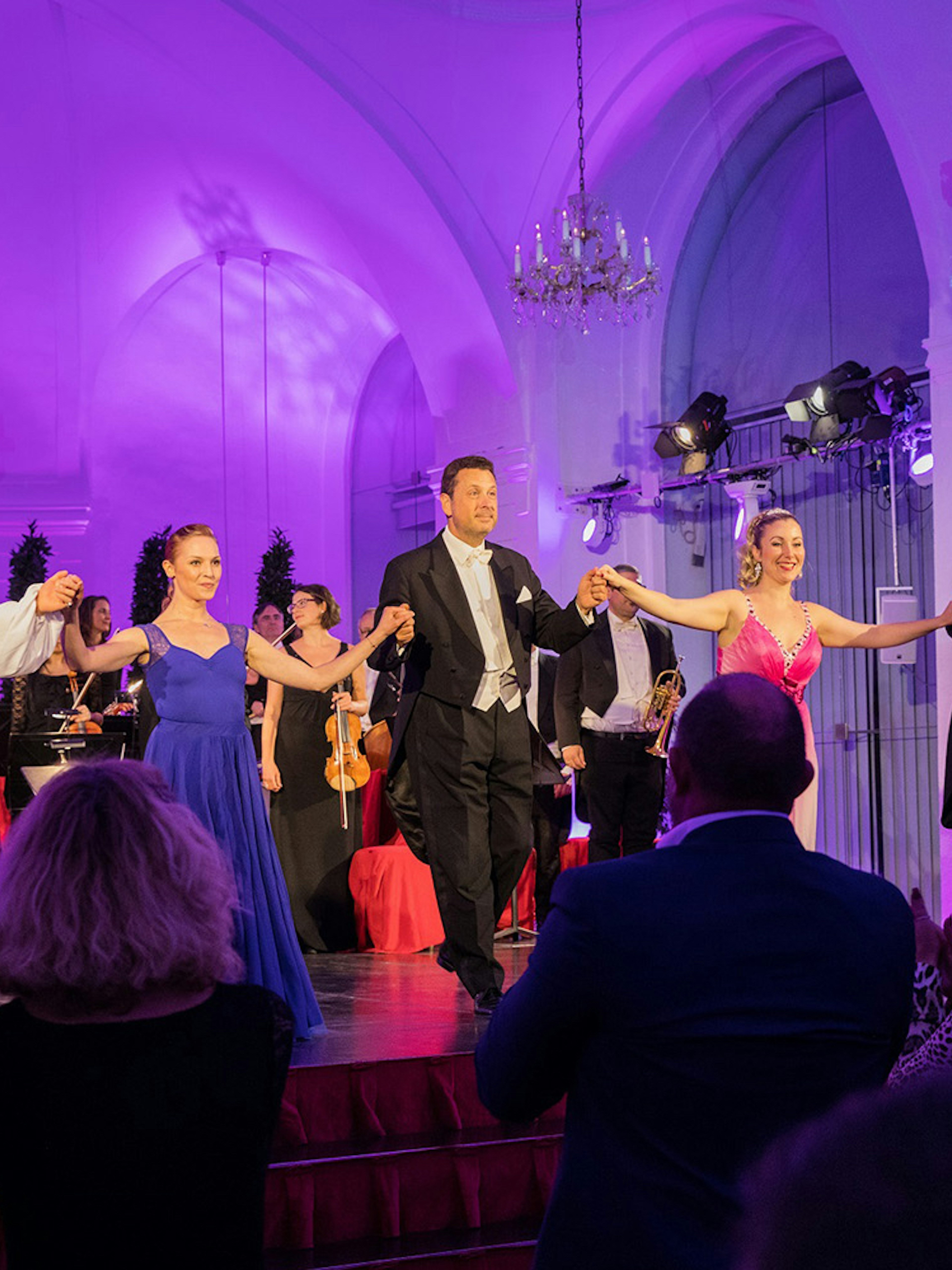 Performers taking a bow at a Mozart and Strauss concert in Schönbrunn Palace.