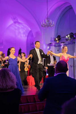 Performers taking a bow at a Mozart and Strauss concert in Schönbrunn Palace.