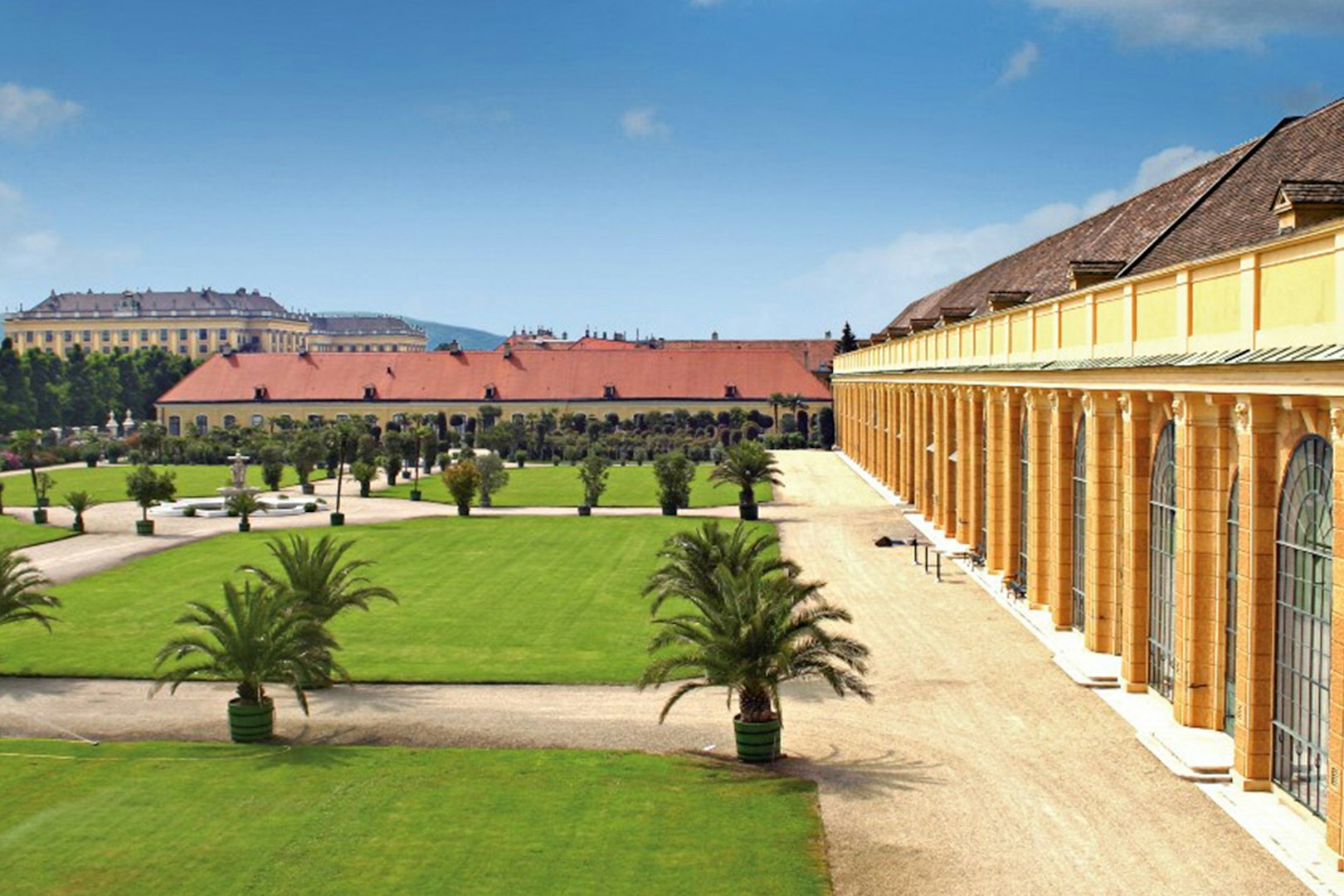Schönbrunn Palace gardens with historic architecture, Vienna, Austria.