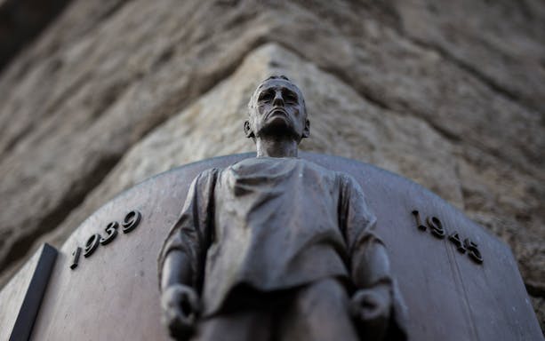 Statue commemorating historical events from 1939 to 1945 in Prague.
