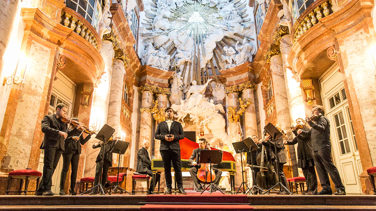 https://cdn-imgix.headout.com/tour/36303/TOUR-IMAGE/c04bd144-287d-4c76-bde0-ae12cb864432-18830-vienna-vienna-vivaldi-s-four-seasons-concert-in-karlskirche-02.jpg?auto=format&w=1800&h=900&fit=fit