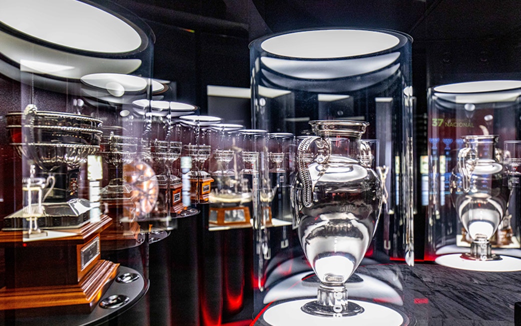 Trophies displayed in SL Benfica Museum during guided tour.