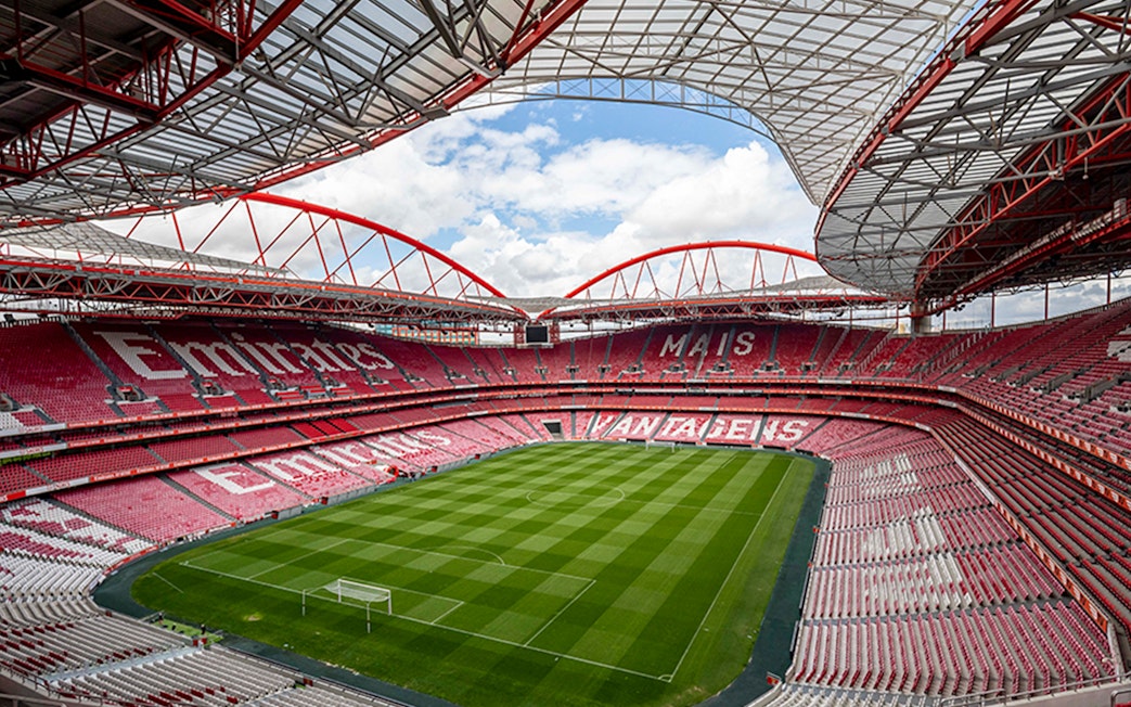 SL Benfica Stadium with empty stands and green pitch, Lisbon, Portugal.