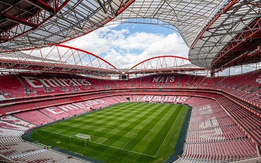 SL Benfica Stadium with empty stands and green pitch, Lisbon, Portugal.