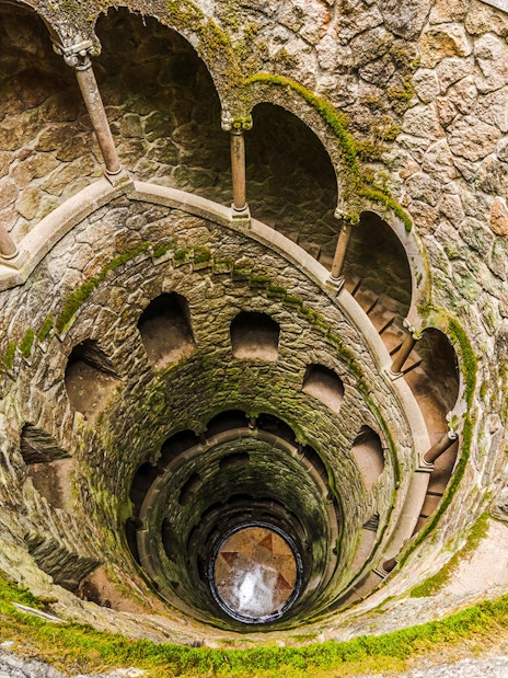 Quinta da Regaleira's Initiation Well spiral staircase in Sintra, Portugal.