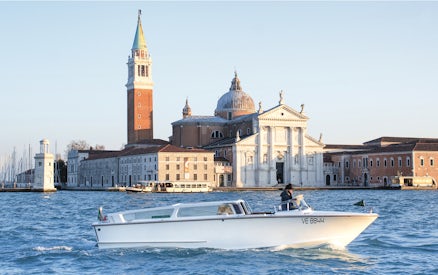 Private water taxi near San Giorgio Maggiore, Venice, with Marco Polo Airport transfer service.