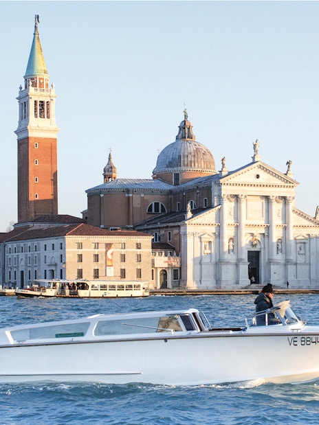 Private water taxi near San Giorgio Maggiore, Venice, with Marco Polo Airport transfer service.