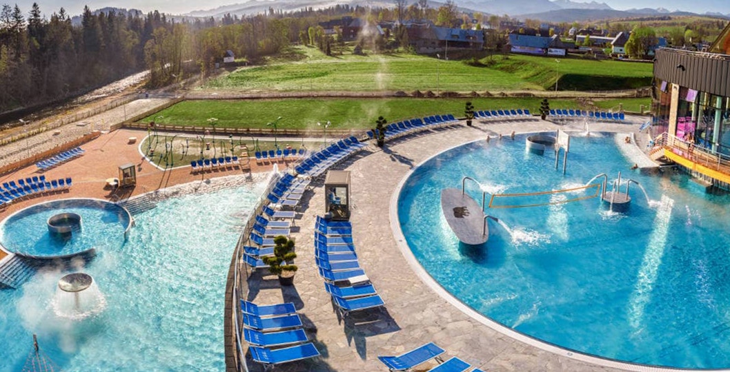Zakopane mountain view with Chocholow Thermal Baths, part of Krakow tour experience.