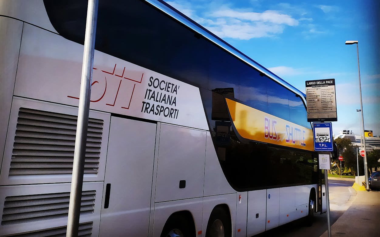 Shuttle bus at Largo della Pace, Civitavecchia Port, for transfers to Rome.