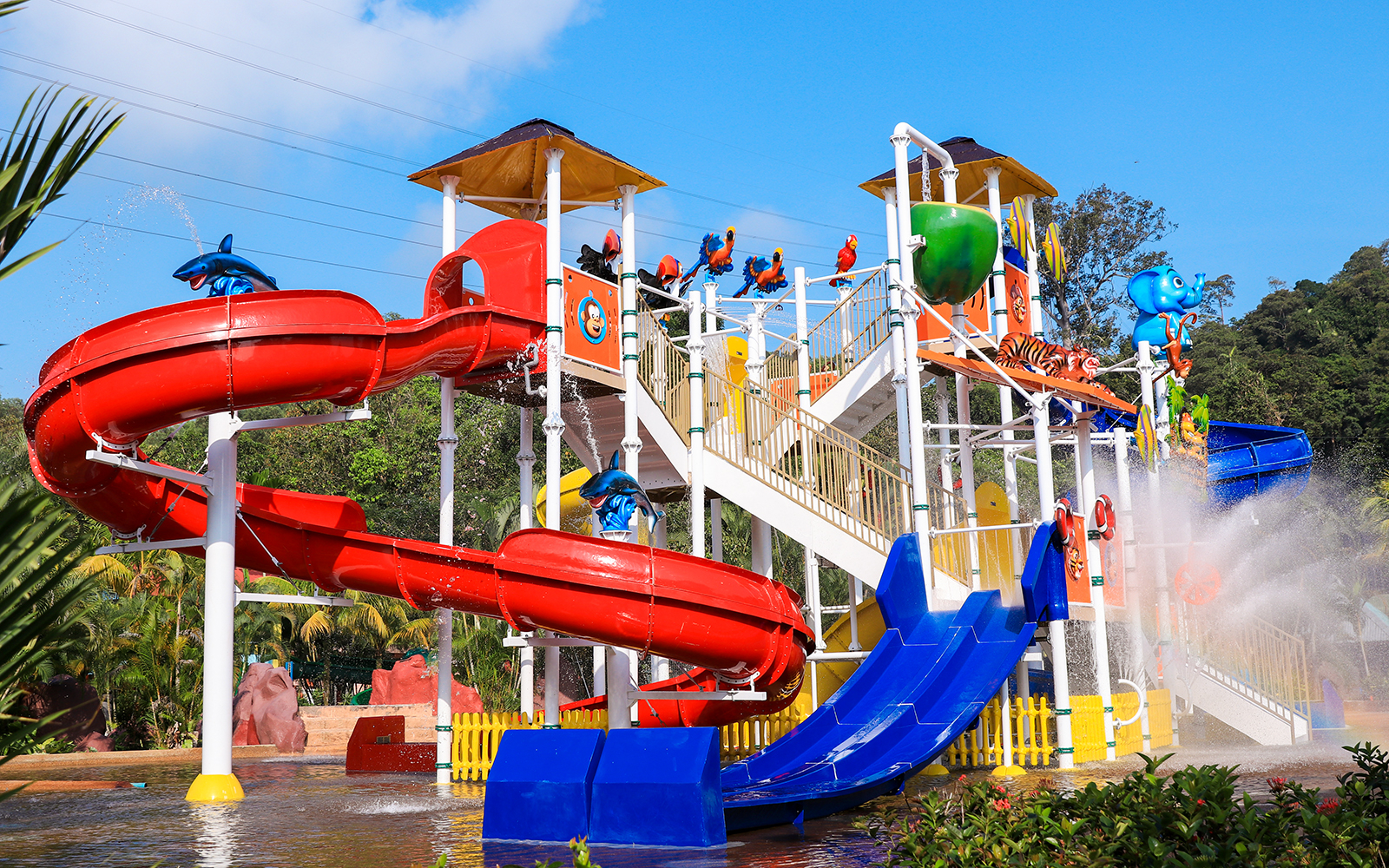 Colorful water slides and play structures at Bukit Merah Laketown Waterpark, Malaysia.
