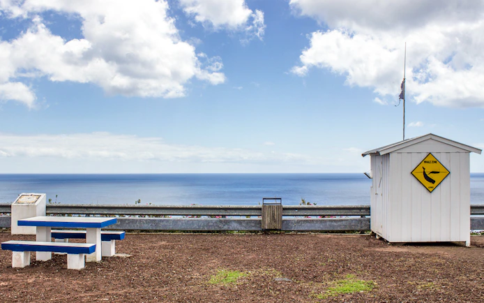 Whale watching hut overlooking the ocean on the Azorean Whalers Heritage Tour.