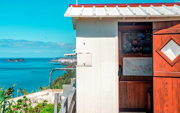 Whaling lookout hut overlooking the ocean on the Azorean Whalers Heritage Tour.