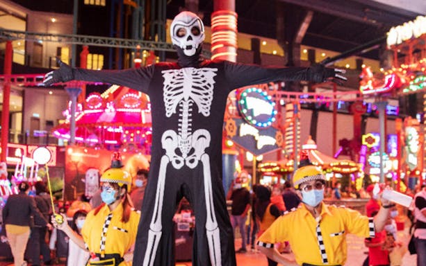 Genting Spookadilly Halloween performers in skeleton costume at Skytropolis theme park.