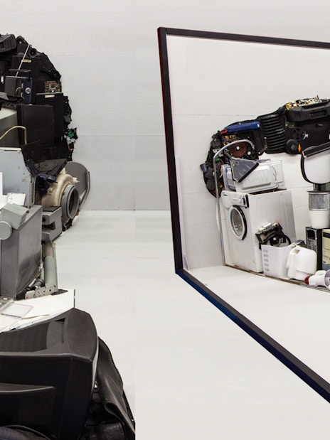 Illusion Art Museum Prague exhibit of a face sculpture made from electronic parts.