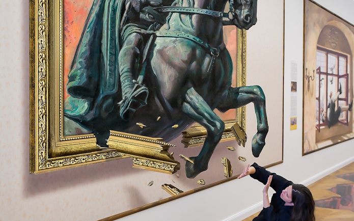 Horse sculpture illusion at Illusion Art Museum Prague with visitor interacting.