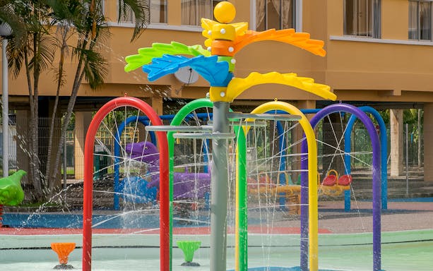 Colorful water play area with fountains at Ehsan Waterpark.