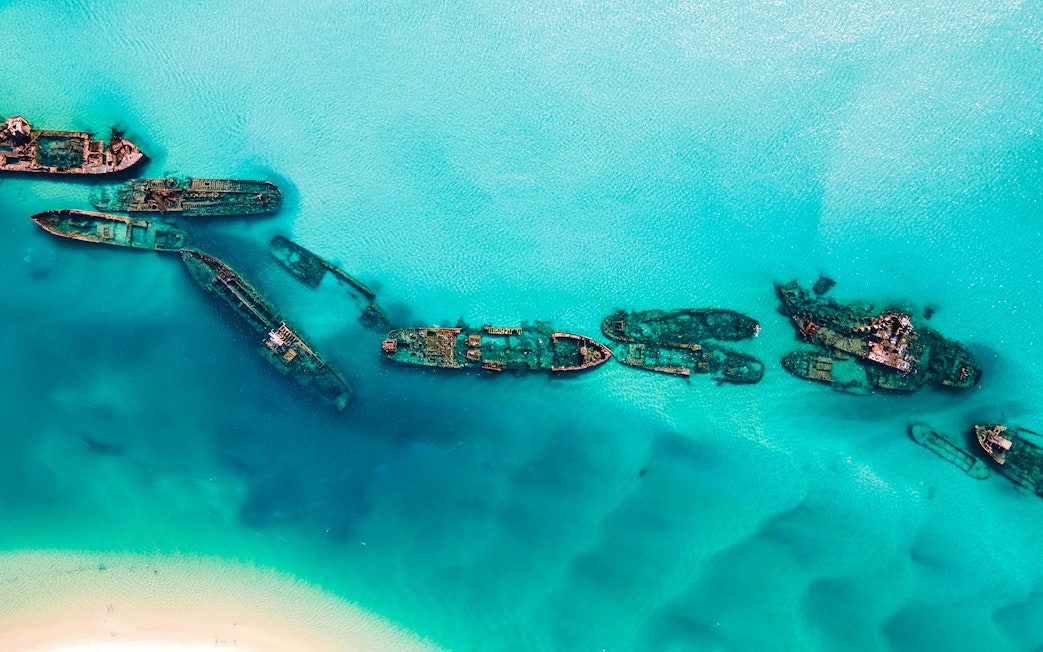 Shipwrecks in clear water on Moreton Island snorkeling and kayaking tour.