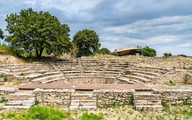 Ancient Troy ruins with stone walls and pathways, skip-the-line tickets, audio guide, Turkey.
