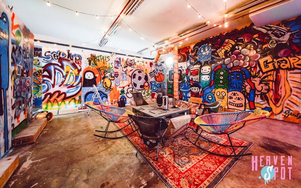Graffiti-covered walls inside Heaven Spot Graffiti Warehouse, Singapore.