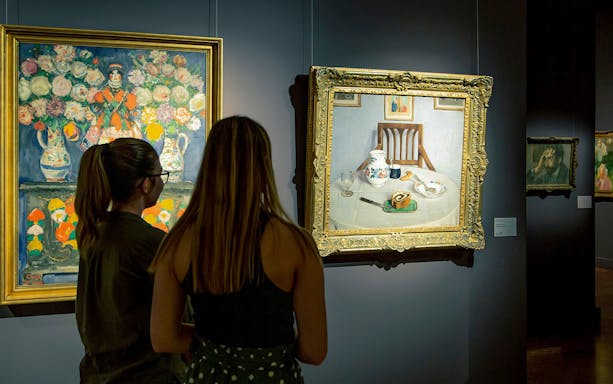 Visitors viewing paintings at the Hungarian National Gallery.