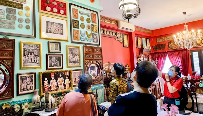 Peranakan artifacts display during Night at the Museum Guided Tour in Singapore.