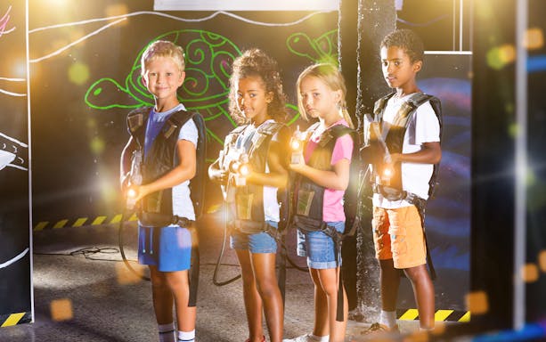 Children playing laser tag at Laser Quest Bukit Batok.