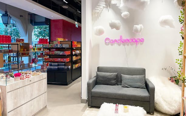 Candle Making Workshops at Candlescape with cozy seating and colorful supplies.