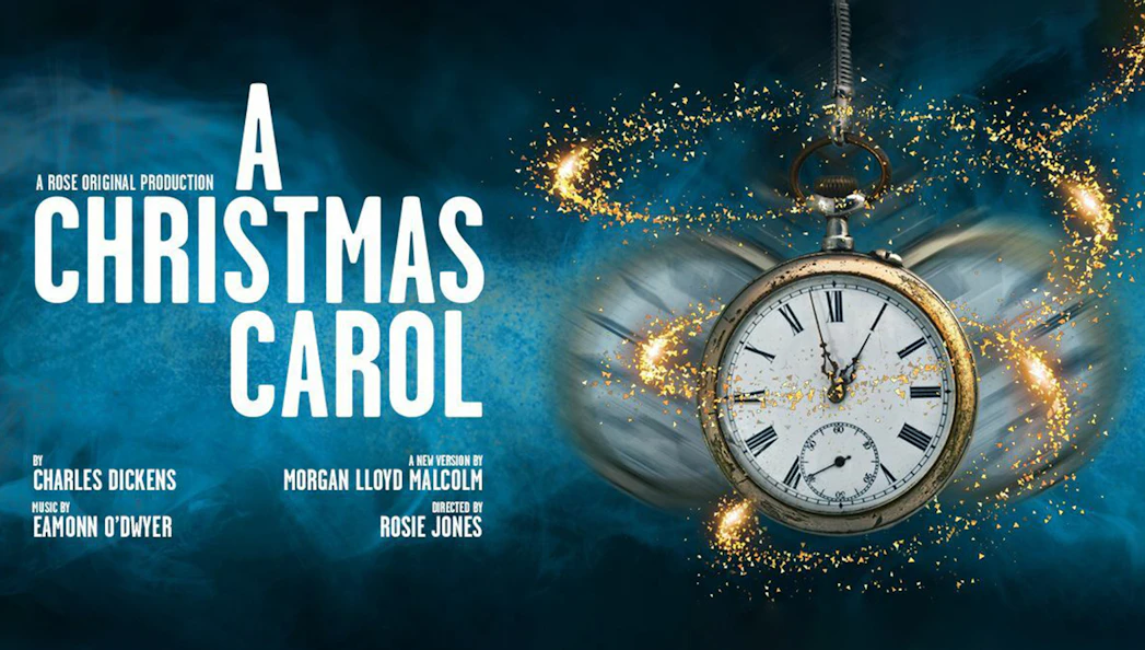 A Christmas Carol production poster with a vintage pocket watch at Rose Theatre.