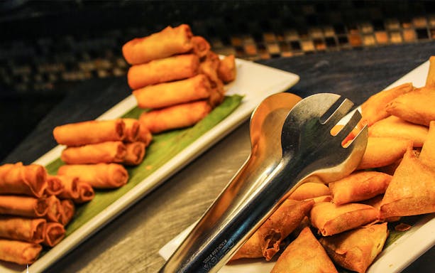Spring rolls and samosas served at Atmosphere 360 Valentine's Day dinner.