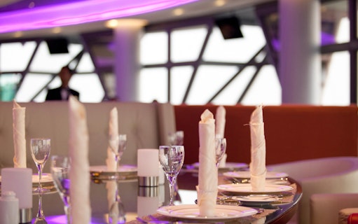 Hi Tea setup at ARAS Revolving Restaurant, KL Tower, with elegant table settings.