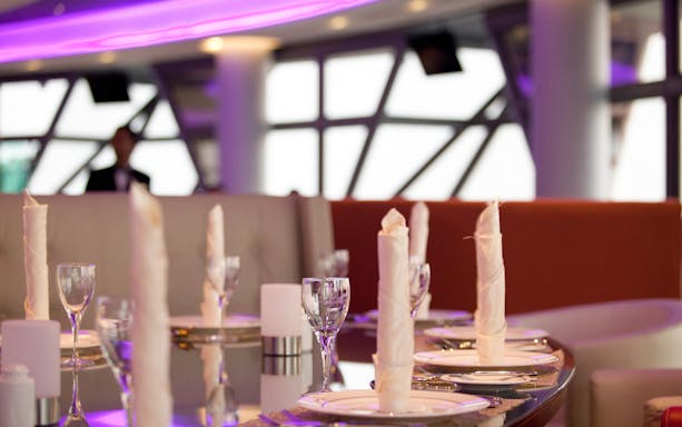 Hi Tea setup at ARAS Revolving Restaurant, KL Tower, with elegant table settings.