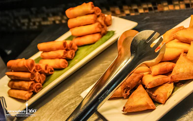 Spring rolls and samosas at Atmosphere 360 Revolving Restaurant buffet.