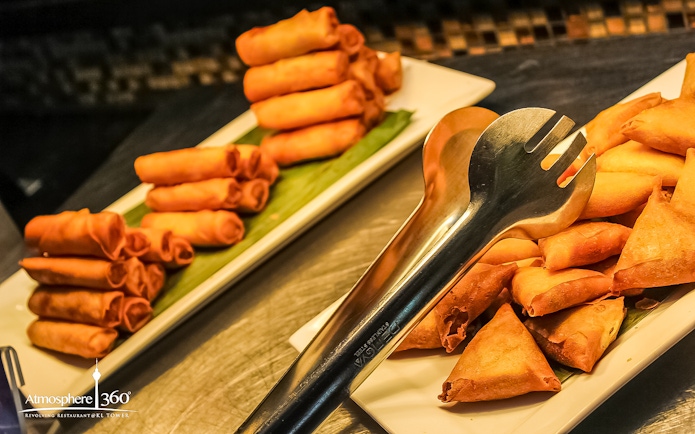 Spring rolls and samosas at Atmosphere 360 Revolving Restaurant buffet.