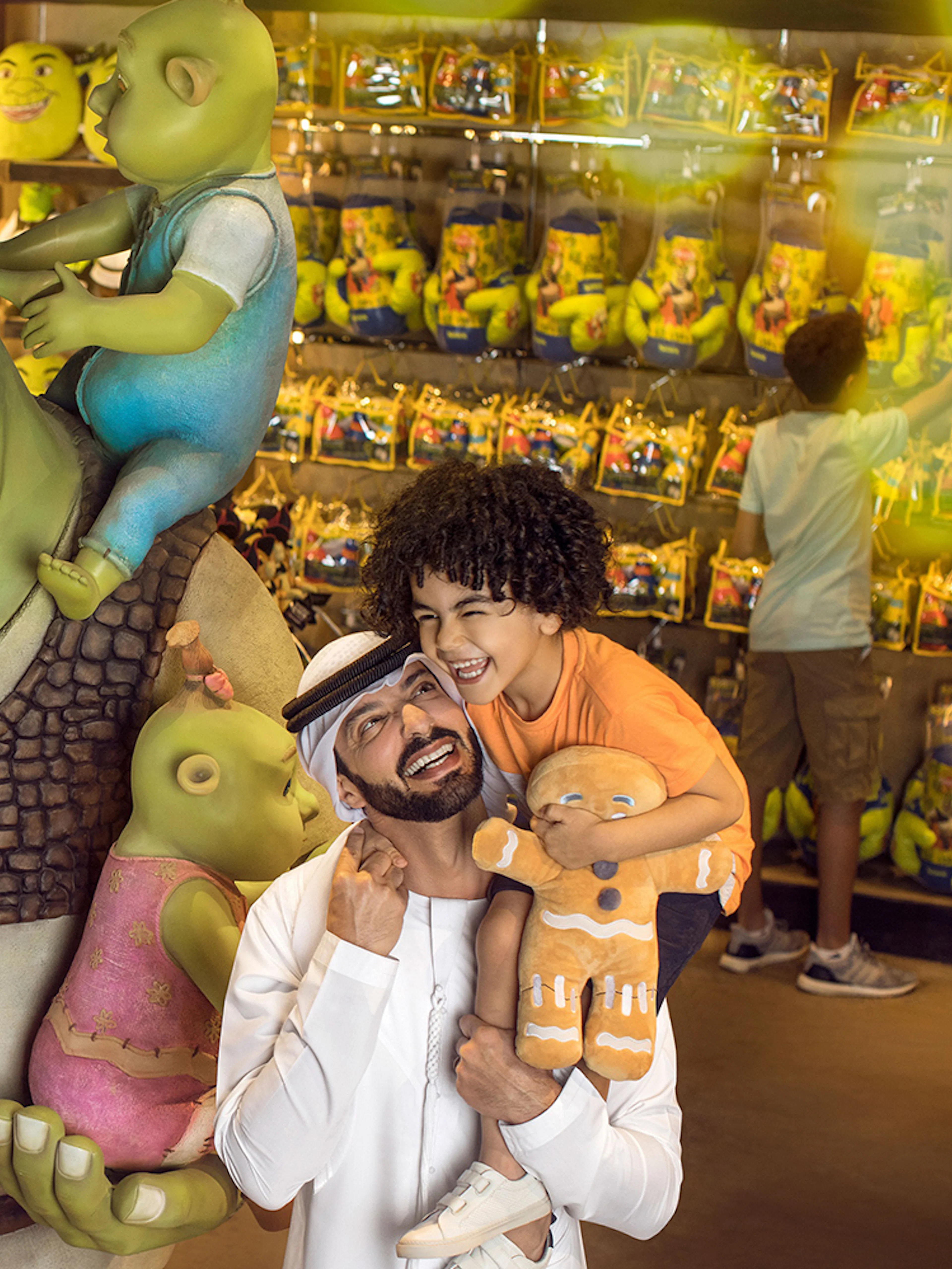 Family enjoying Shrek store at MOTIONGATE Theme Park, Dubai Parks and Resorts.