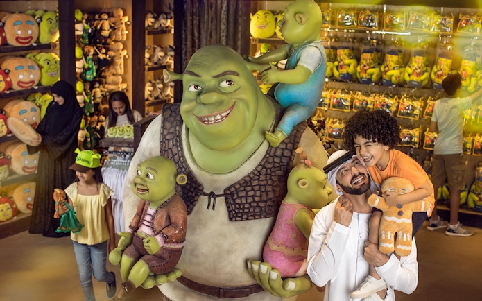 Family enjoying Shrek store at MOTIONGATE Theme Park, Dubai Parks and Resorts.