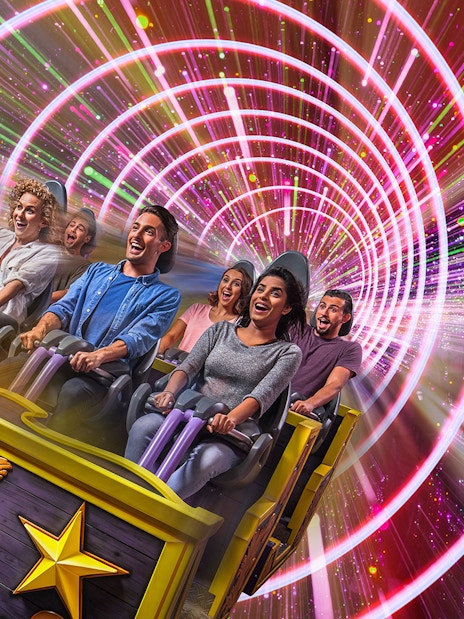 Visitors on a roller coaster at MOTIONGATE Theme Park, Dubai Parks and Resorts.