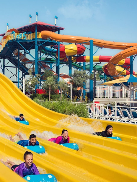 Visitors enjoying water slides at Dubai Parks and Resorts.