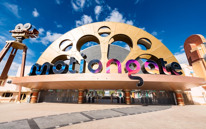 Entrance to MOTIONGATE Theme Park with iconic film reel design.