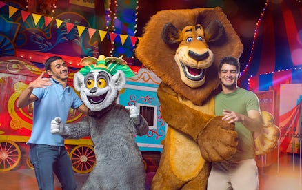 Characters from Madagascar with visitors at MOTIONGATE Theme Park, Dubai Parks and Resorts.