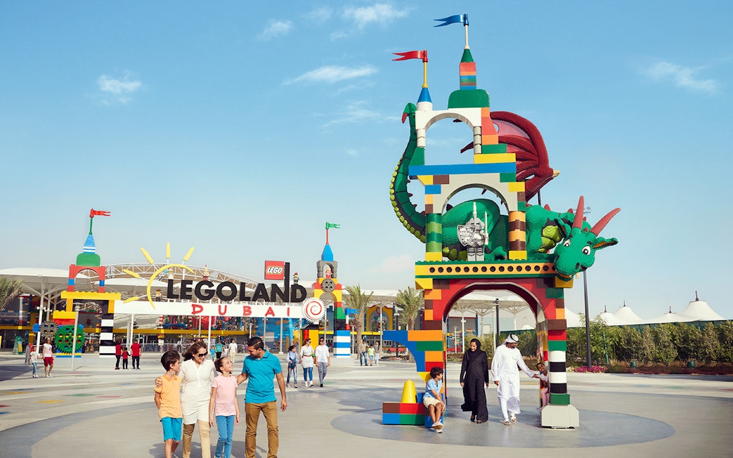 Legoland Dubai entrance with colorful dragon sculpture, part of Dubai Parks and Resorts.
