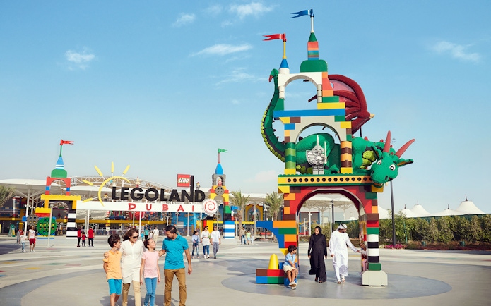 Legoland Dubai entrance with colorful dragon sculpture, part of Dubai Parks and Resorts.