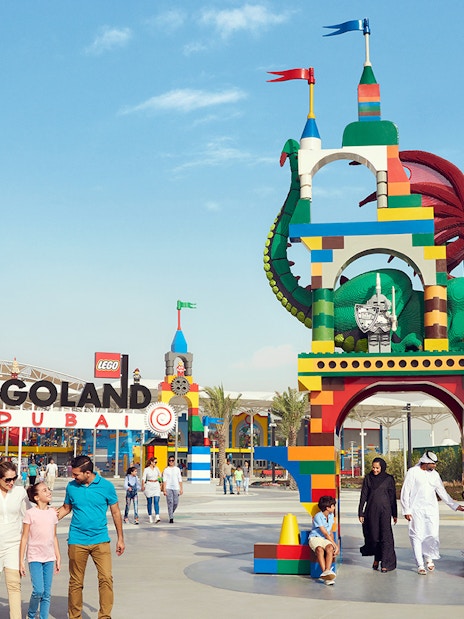 Legoland Dubai entrance with colorful dragon sculpture, part of Dubai Parks and Resorts.