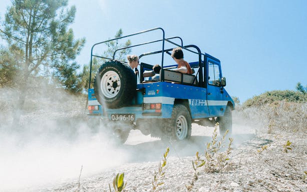 Jeep driving through Sintra countryside on guided safari tour from Lisbon.