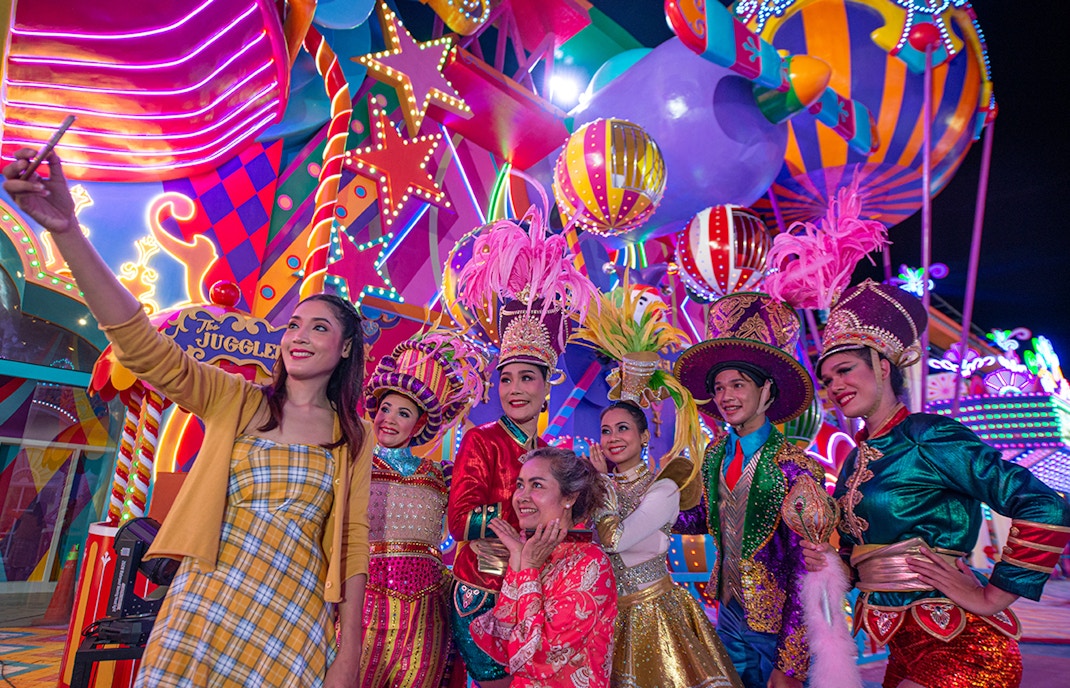 Phuket Carnival Magic Park entrance with vibrant lights and decorations, Thailand.