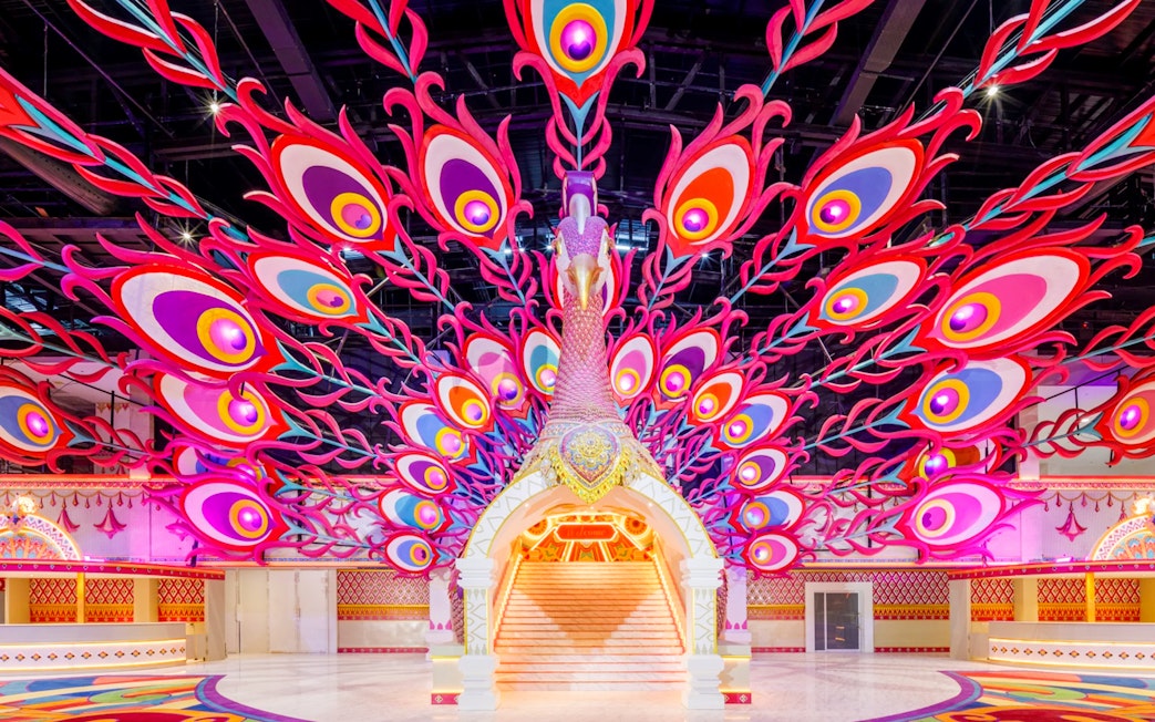 Peacock-themed entrance at Carnival Magic Park in Phuket.
