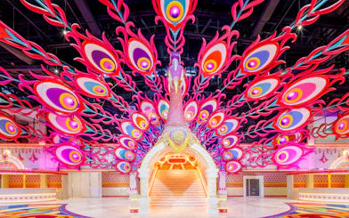 Peacock-themed entrance at Carnival Magic Park in Phuket.
