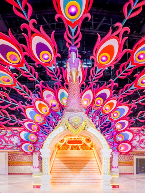 Peacock-themed entrance at Carnival Magic Park in Phuket.