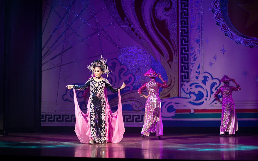 Performer in traditional costume on stage at Alcazar Cabaret Show, Pattaya.