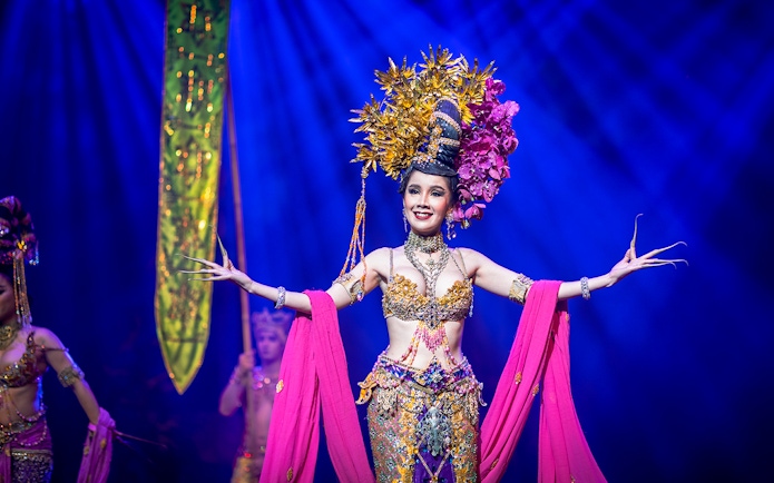 Performer in elaborate costume at Alcazar Cabaret Show, Pattaya.