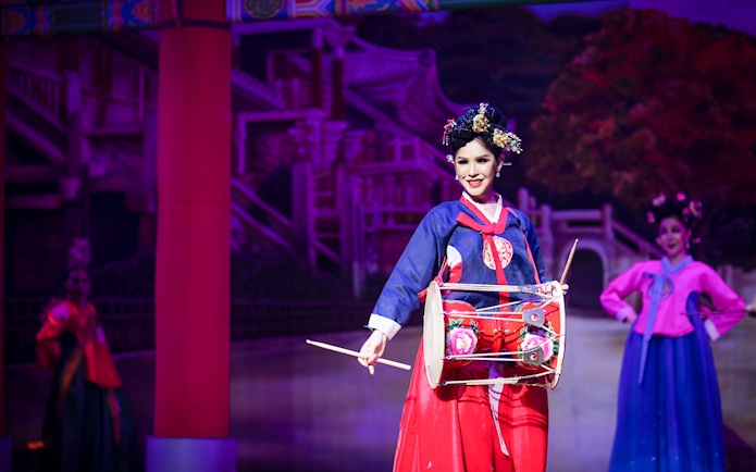 Performer in traditional costume at Alcazar Cabaret Show, Pattaya.